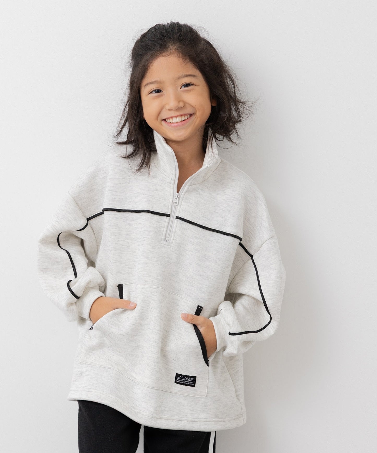 ダンボールニットハーフジップパイピングトレーナー